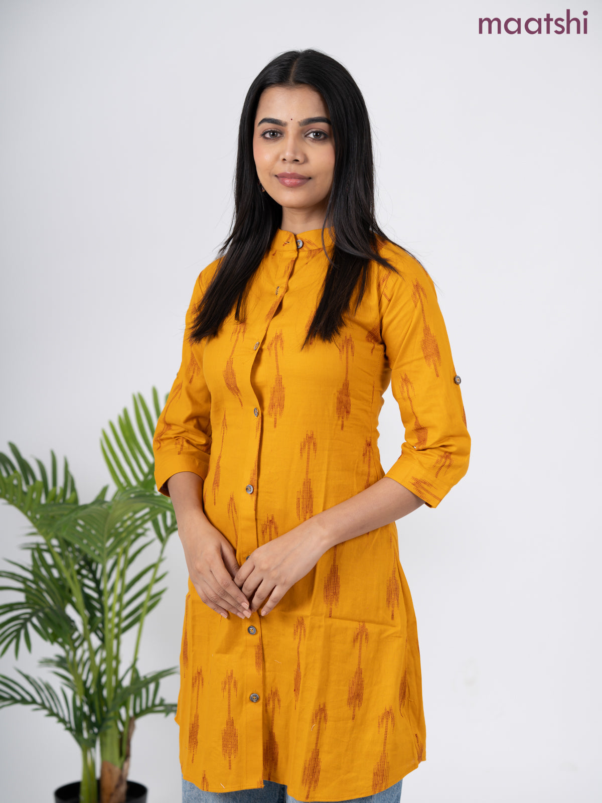 Cotton short kurti mustard yellow with allover ikat weaves & simple neck pattern without pant