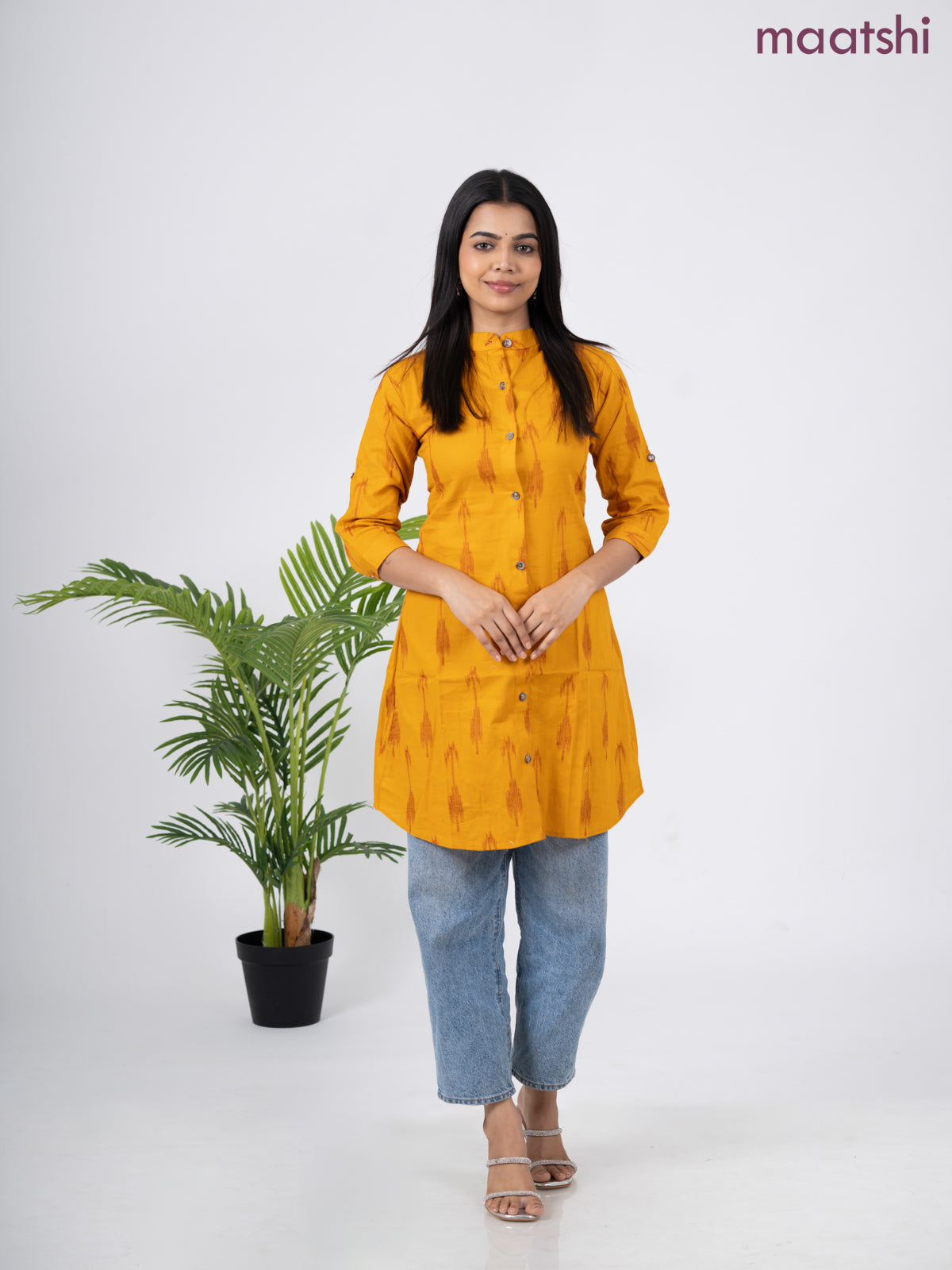 Cotton short kurti mustard yellow with allover ikat weaves & simple neck pattern without pant