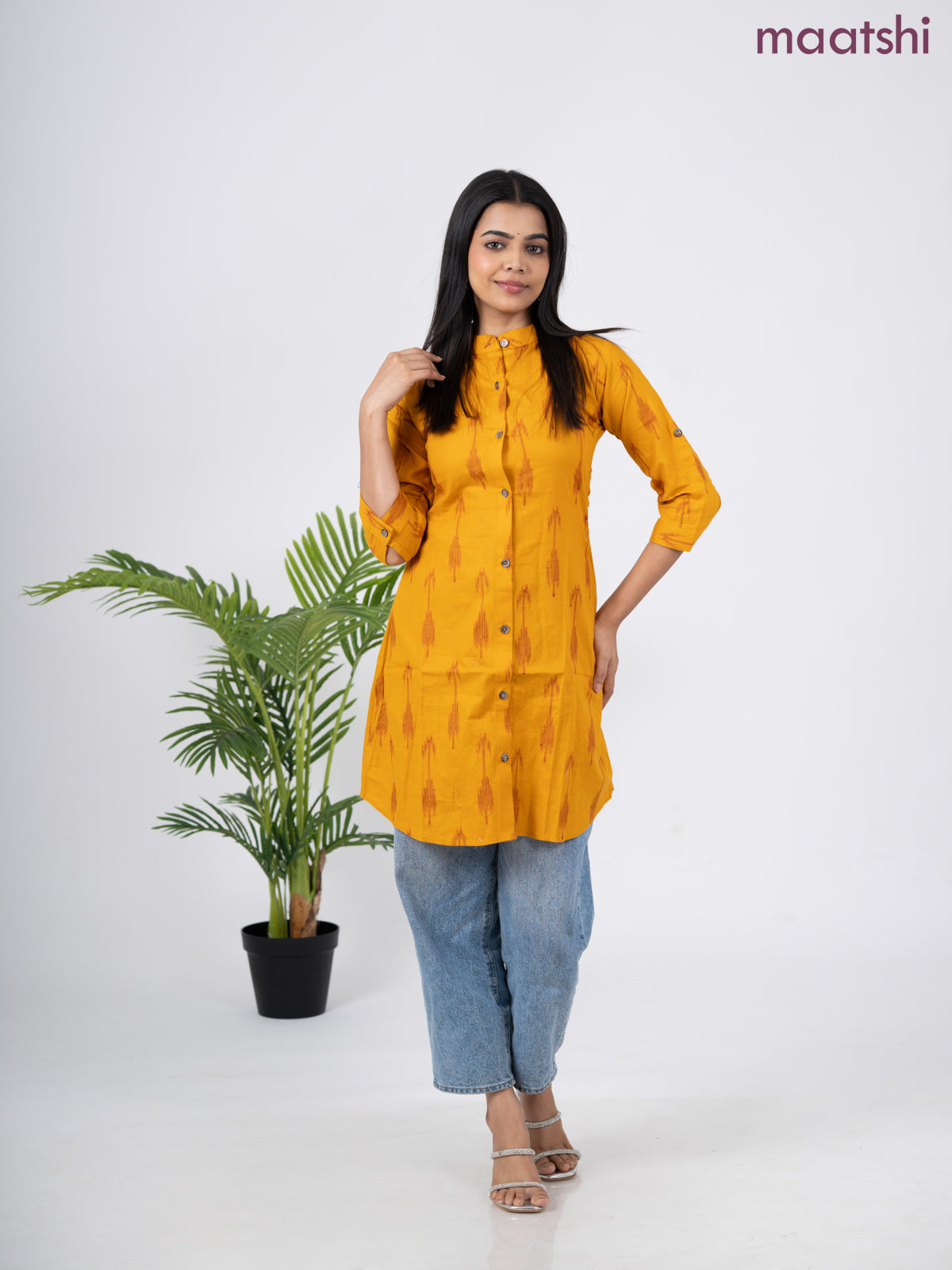 Cotton short kurti mustard yellow with allover ikat weaves & simple neck pattern without pant