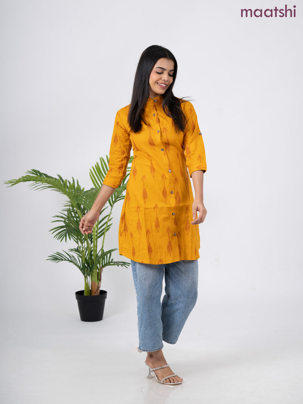 Cotton short kurti mustard yellow with allover ikat weaves & simple neck pattern without pant