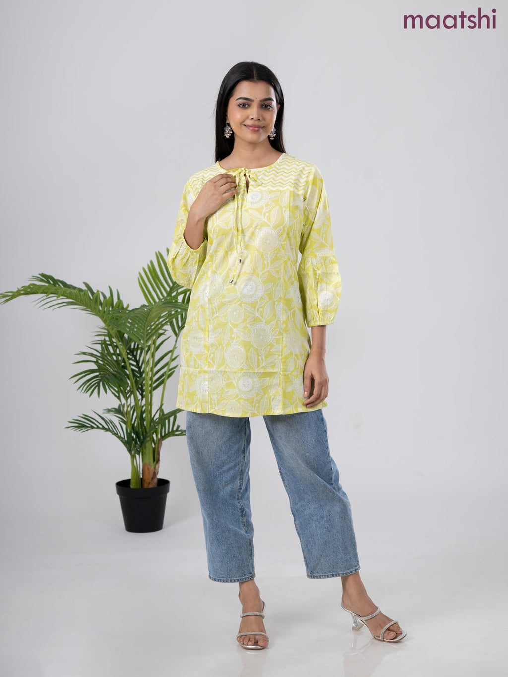Cotton short kurti lime green and off white with allover prints & simple neck pattern without pant