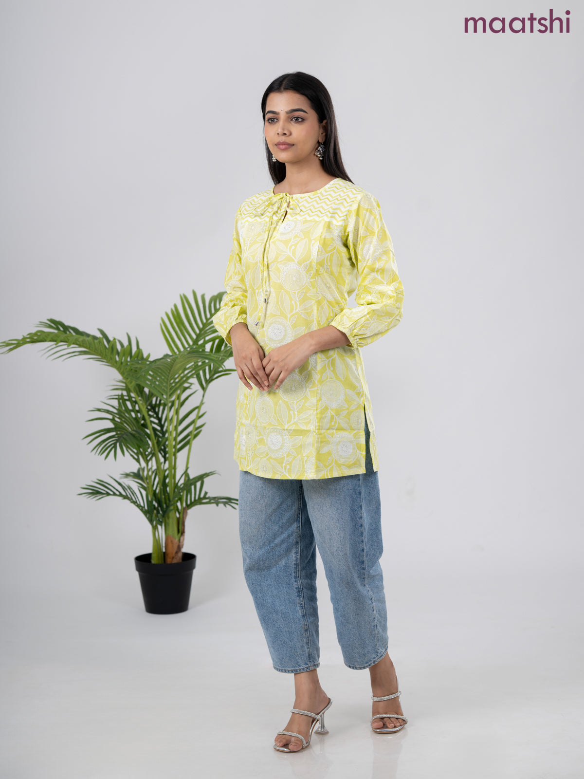 Cotton short kurti lime green and off white with allover prints & simple neck pattern without pant
