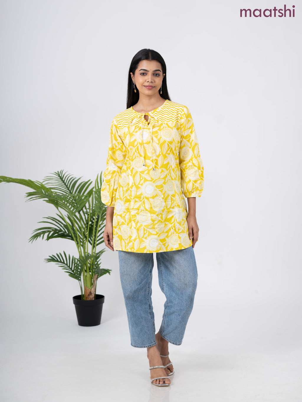 Cotton short kurti yellow and off white with allover prints & simple neck pattern without pant