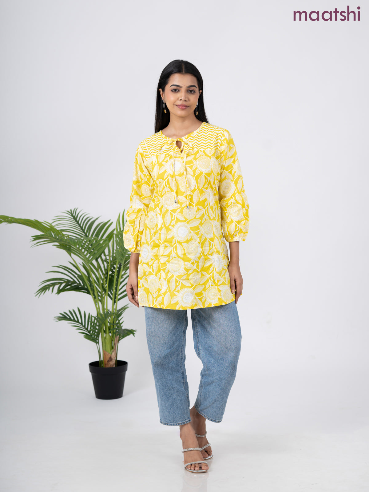 Cotton short kurti yellow and off white with allover prints & simple neck pattern without pant
