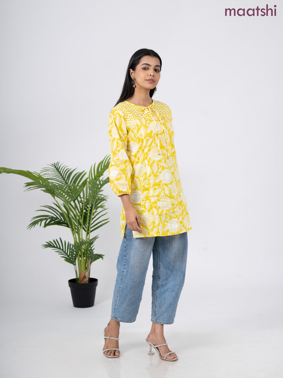 Cotton short kurti yellow and off white with allover prints & simple neck pattern without pant