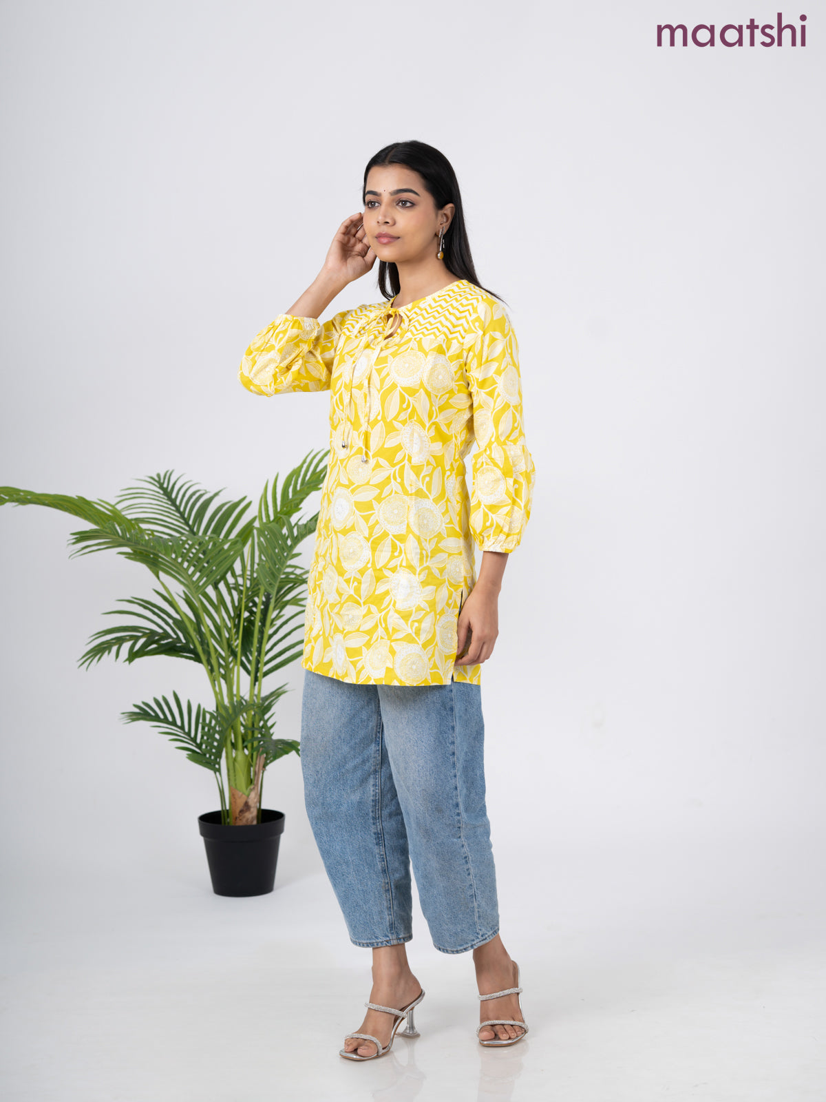 Cotton short kurti yellow and off white with allover prints & simple neck pattern without pant