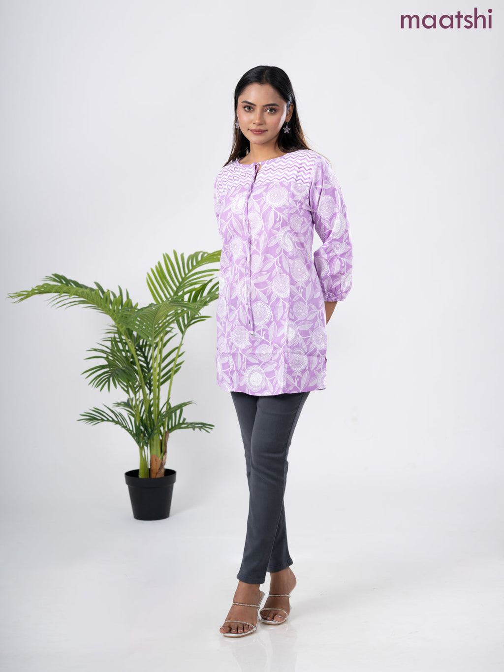 Cotton short kurti lavender and off white with allover prints & simple neck pattern without pant