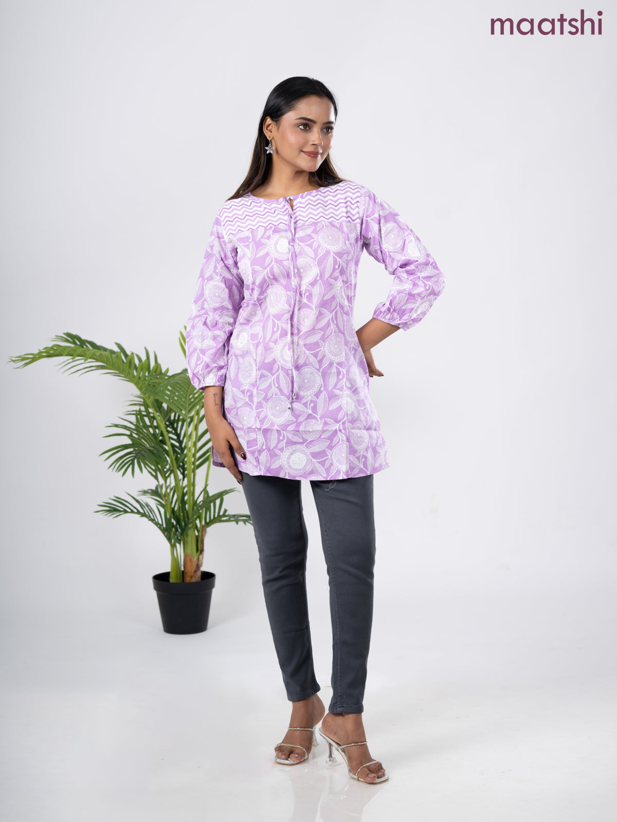 Cotton short kurti lavender and off white with allover prints & simple neck pattern without pant