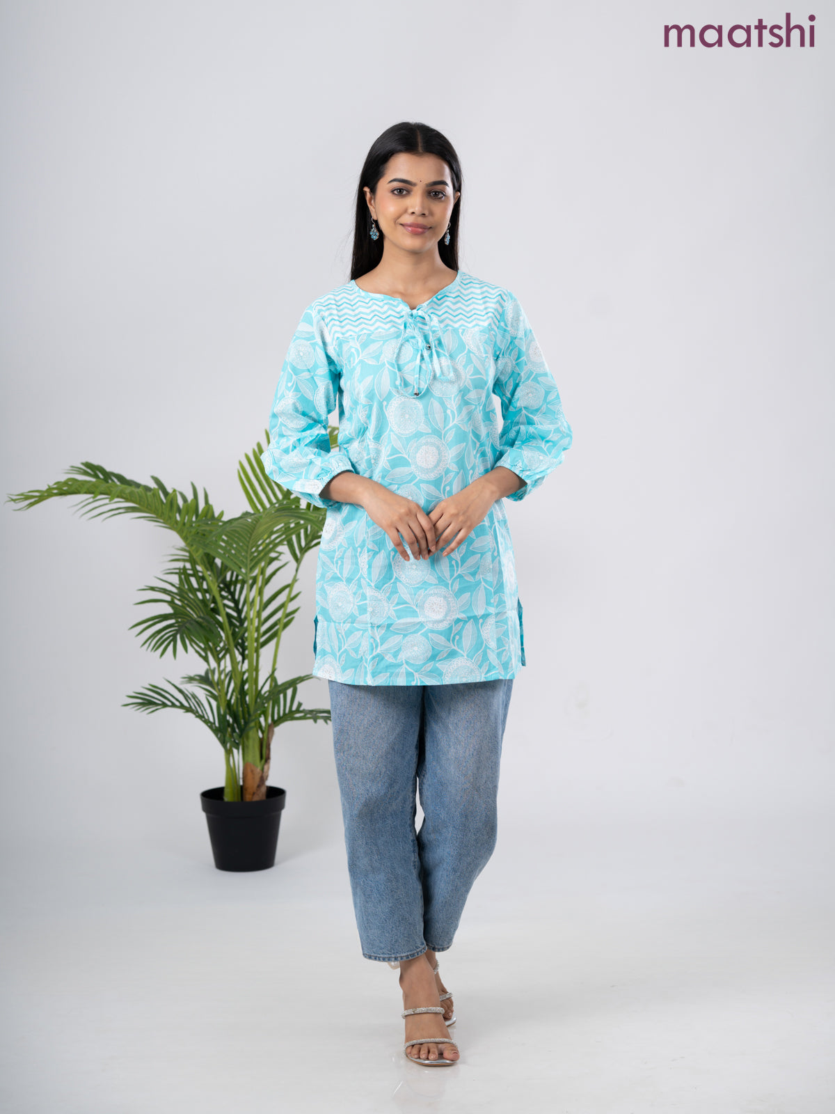 Cotton short kurti light blue and off white with allover prints & simple neck pattern without pant