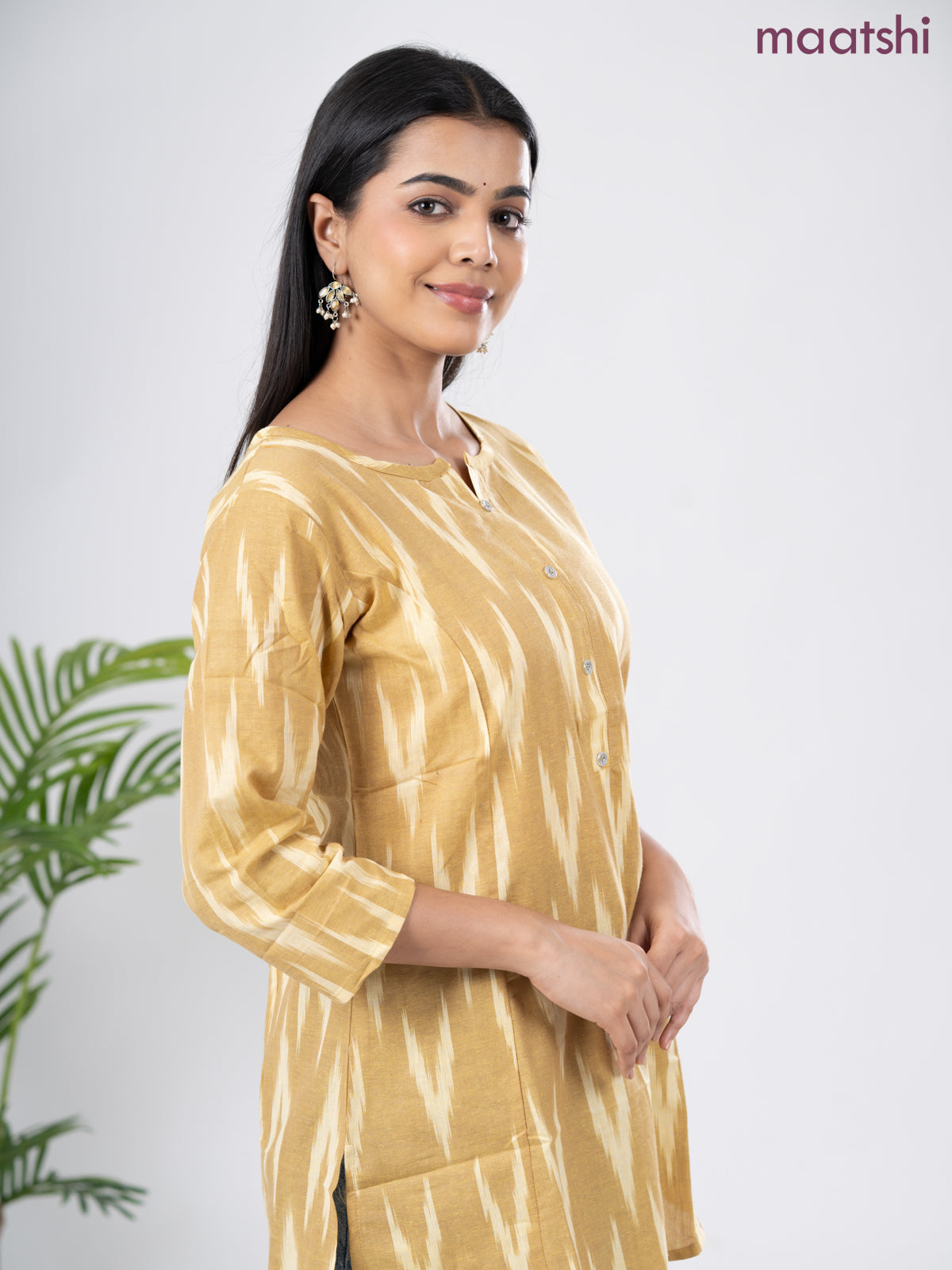 Cotton short kurti sandal with allover ikat weaves & simple neck pattern without pant