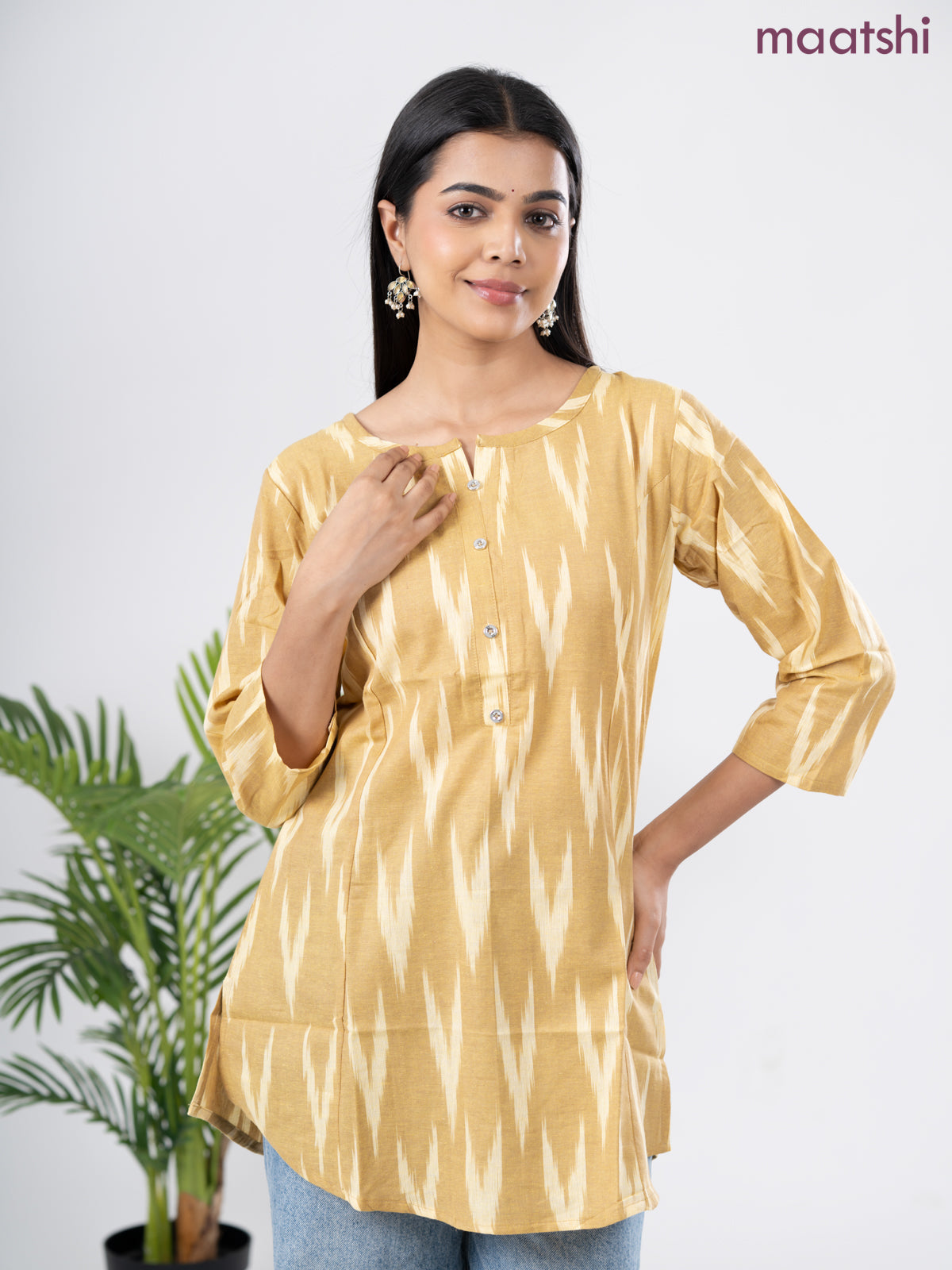 Cotton short kurti sandal with allover ikat weaves & simple neck pattern without pant