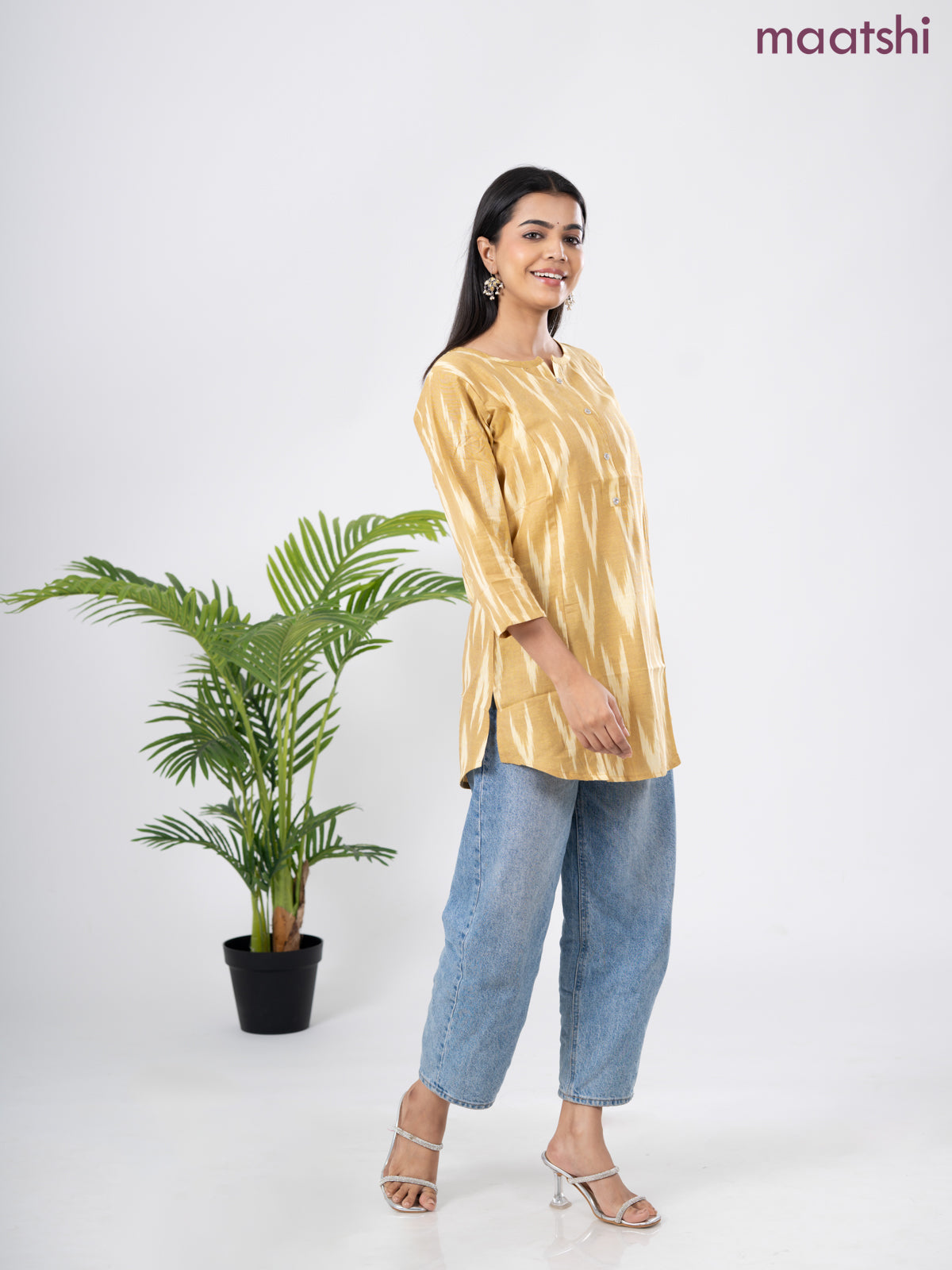 Cotton short kurti sandal with allover ikat weaves & simple neck pattern without pant