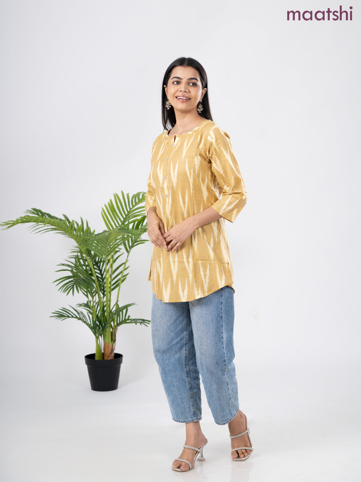 Cotton short kurti sandal with allover ikat weaves & simple neck pattern without pant