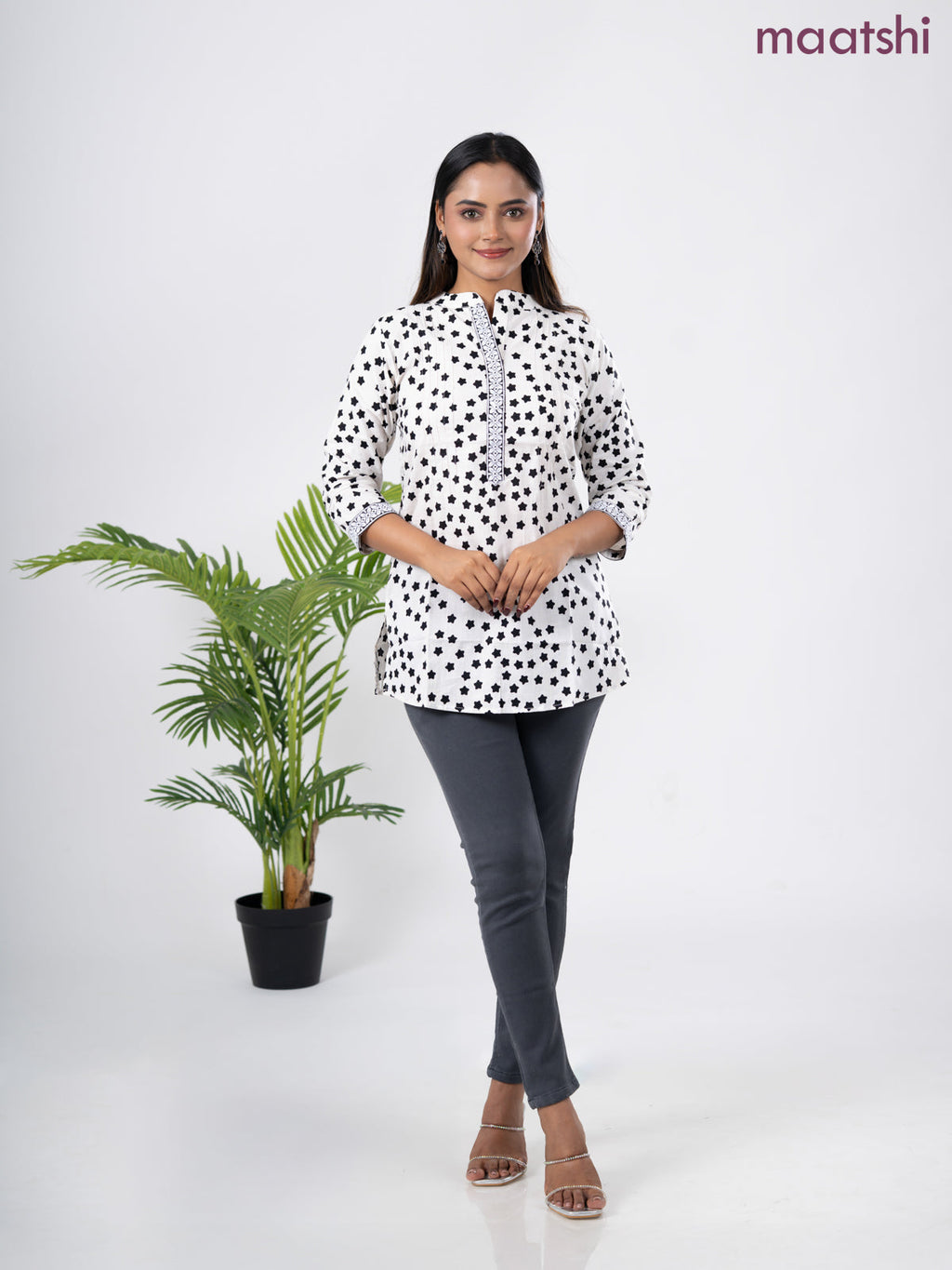Cotton short kurti off white and black with allover star butta prints & embroidery work neck pattern without pant