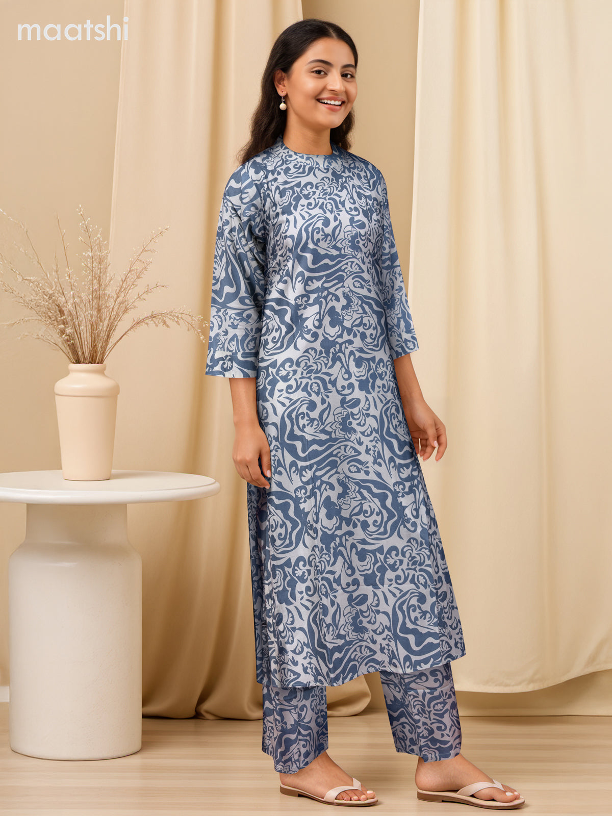 Cotton co-ord set off white and bluish grey with allover prints & simple neck pattern and palazzo pant