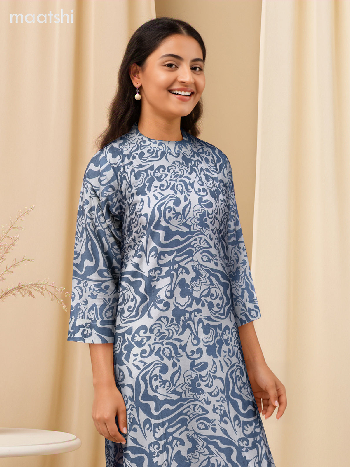 Cotton co-ord set off white and bluish grey with allover prints & simple neck pattern and palazzo pant