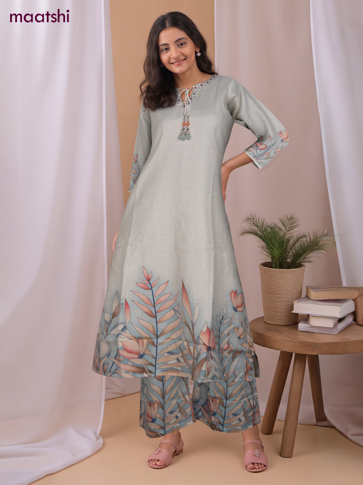 Cotton co-ord set off white with placement prints & beaded work neck pattern and palazzo pant