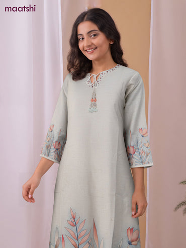 Cotton co-ord set off white with placement prints & beaded work neck pattern and palazzo pant