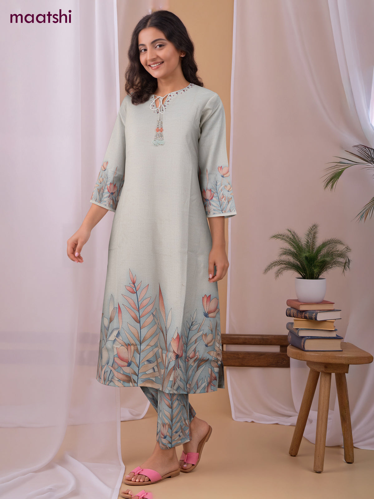 Cotton co-ord set off white with placement prints & beaded work neck pattern and palazzo pant