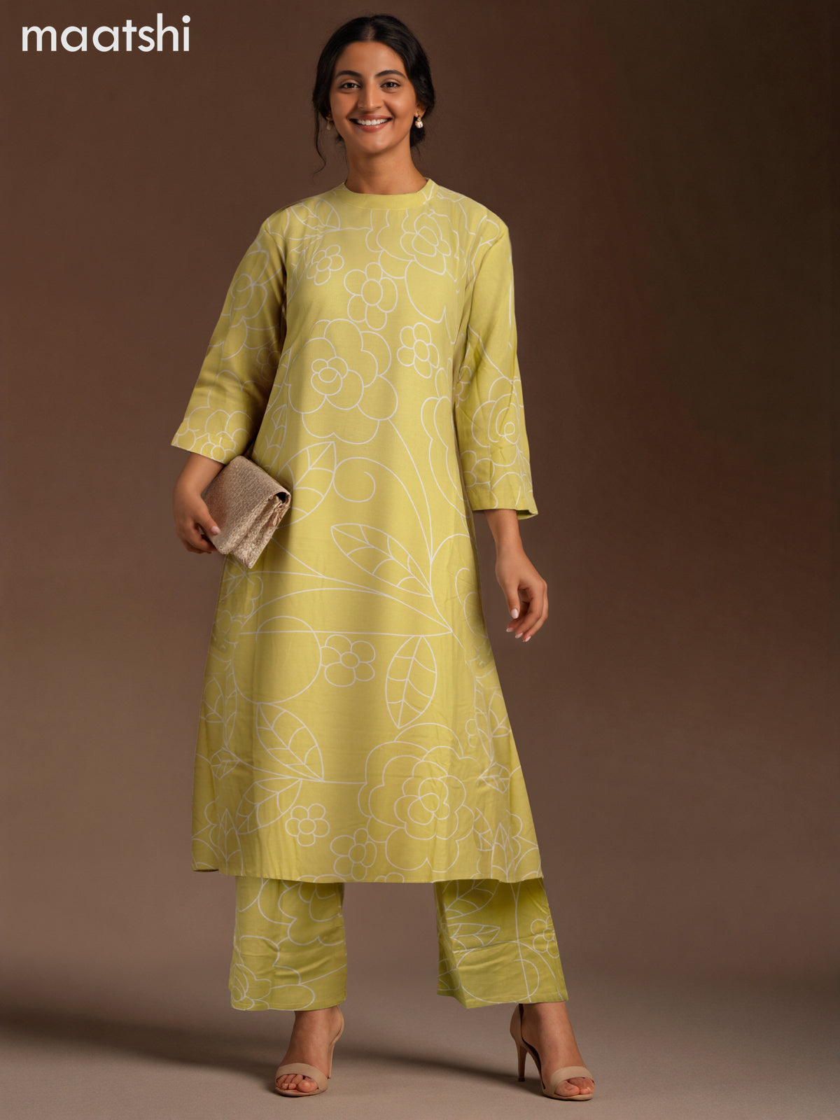 Cotton co-ord set light green and cream with allover floral prints & simple neck pattern and palazzo pant