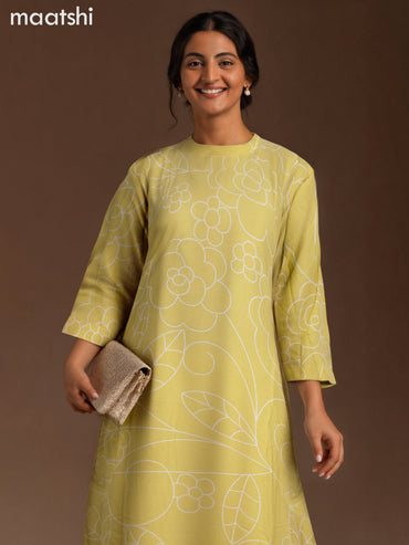 Cotton co-ord set light green and cream with allover floral prints & simple neck pattern and palazzo pant