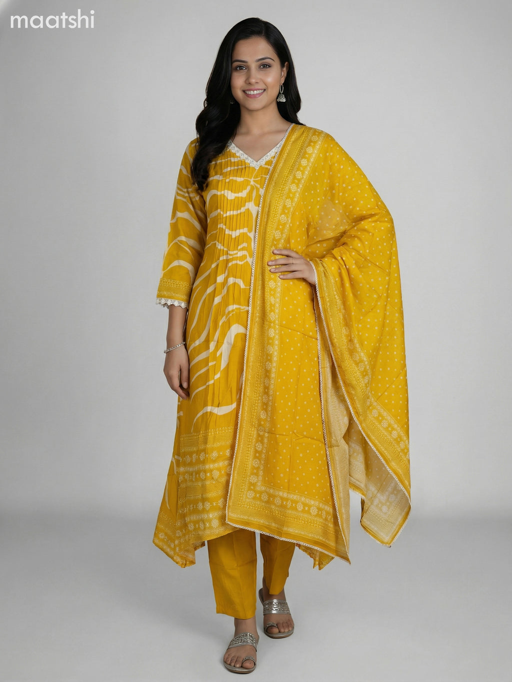 Yellow and Cream Muslin Printed Fish Cut Suit