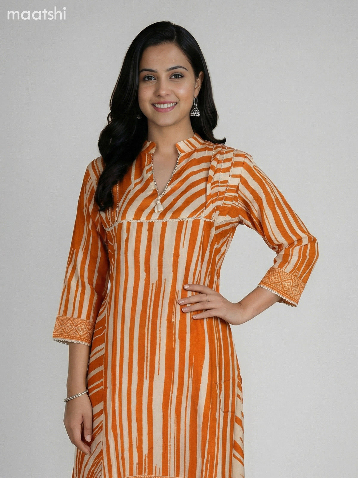 Orange and Cream Muslin Printed Fish Cut Suit