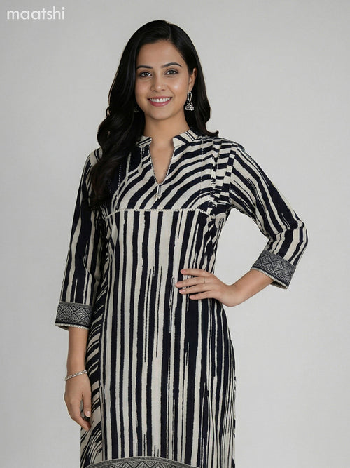 Black and Cream Muslin Printed Fish Cut Suit