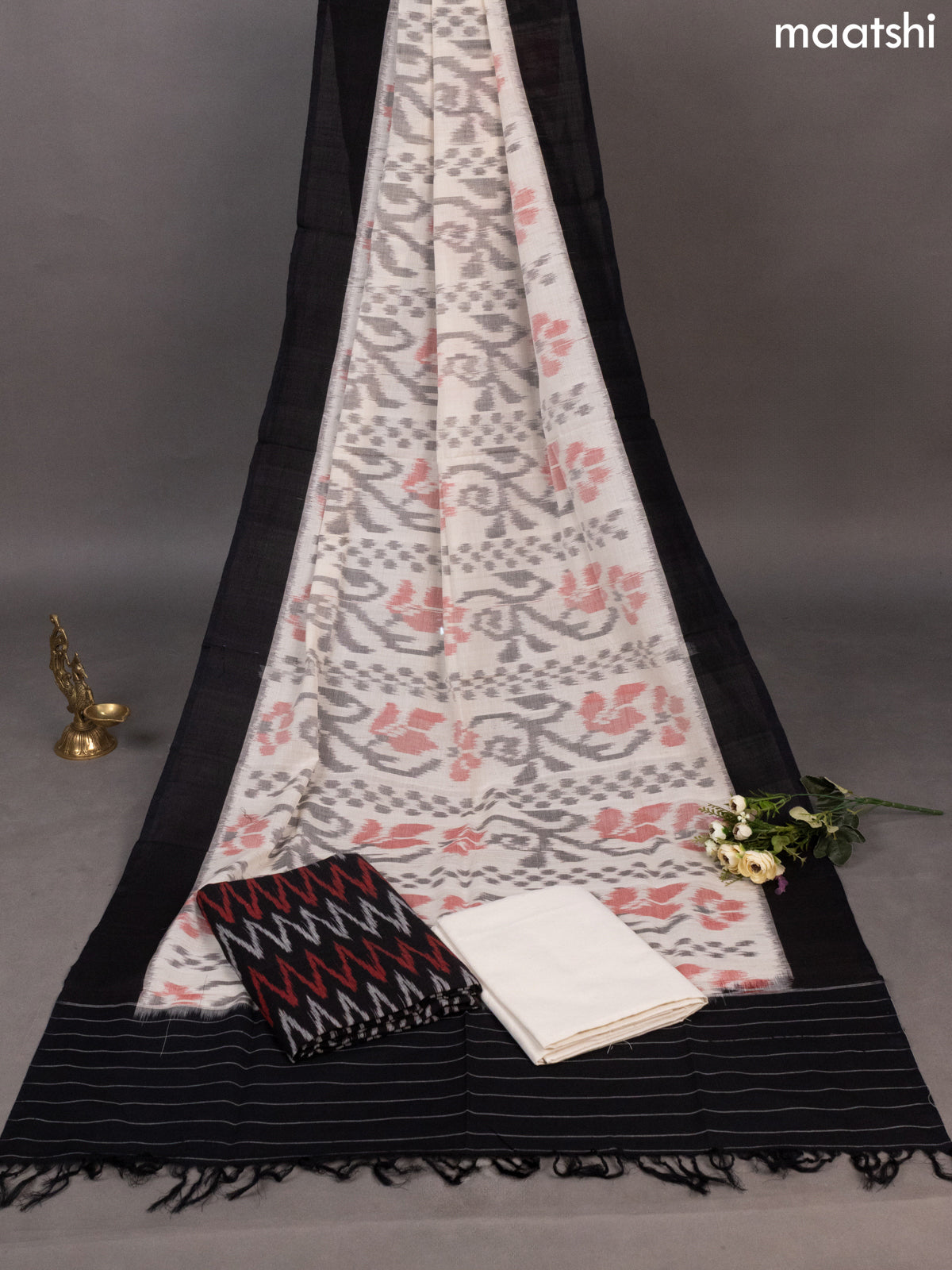 Black and Off White Ikat Cotton Dress Material With Ikat Weaves