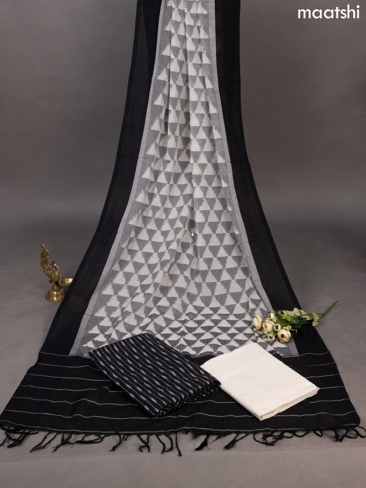 Black and Off White Ikat Cotton Dress Material With Ikat Weaves