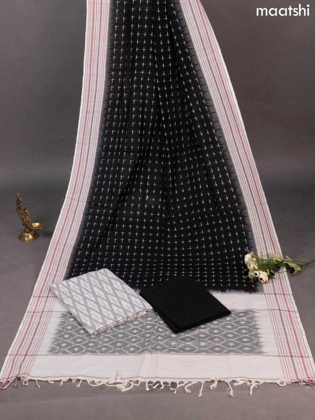 Off White and Black Ikat Cotton Dress Material With Ikat Weaves