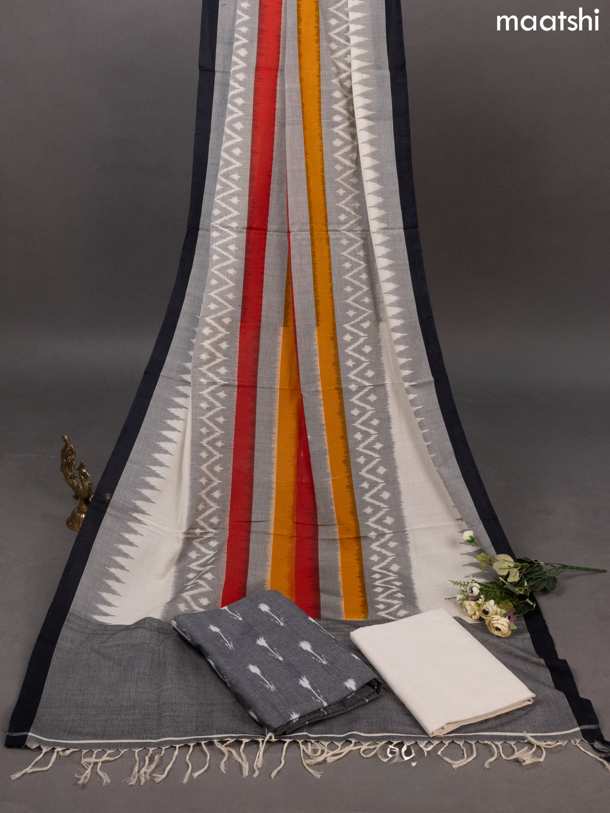 Grey and Off White Ikat Cotton Dress Material With Ikat Butta Weaves