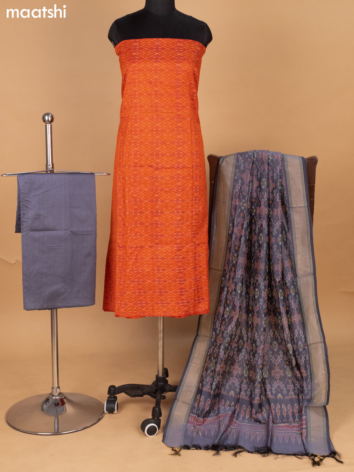 Orange and Grey Ikat Silk Cotton Dress Material With Ikat Weaves