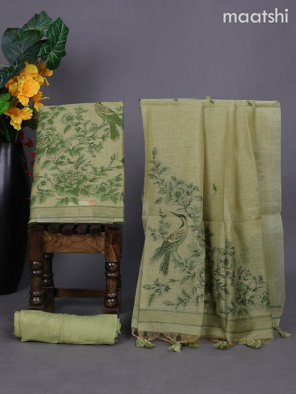 Pastel Green Linen Tissue Dress Material With Thread Buttas