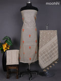 Beige and Peach Shade Linen Dress Material With Embroidery Work Buttas