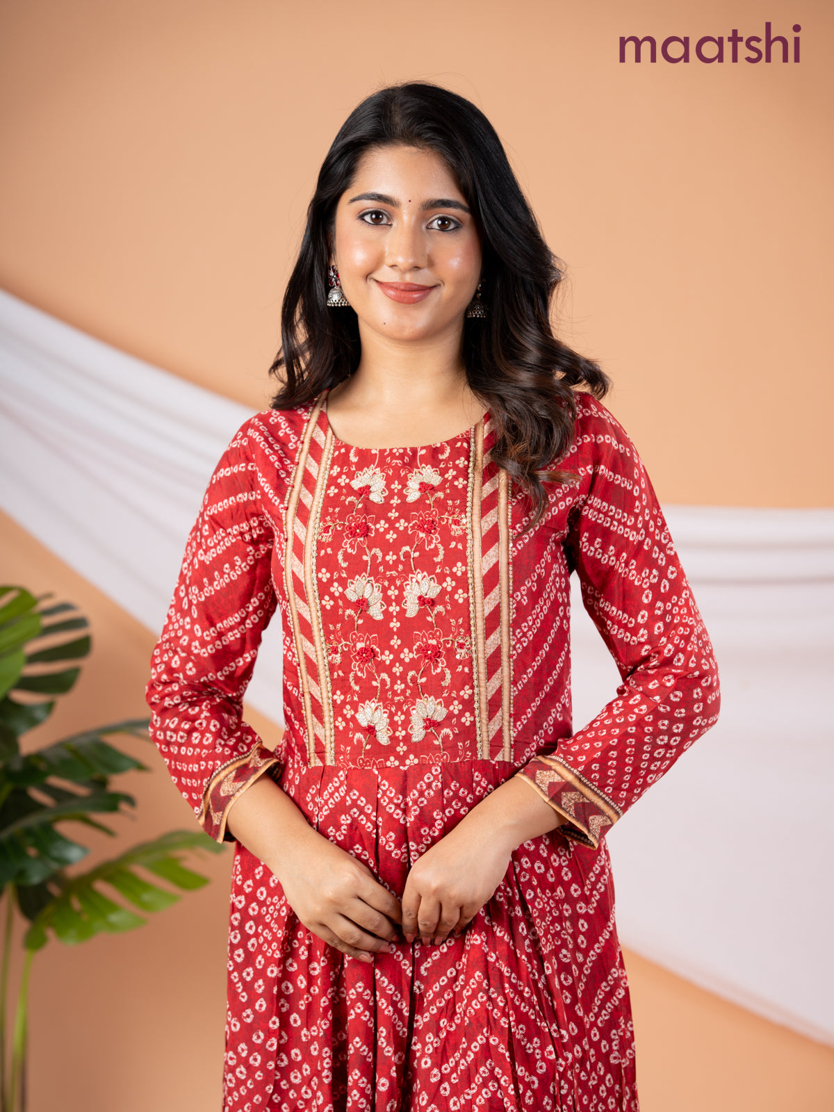 Muslin floor length dress red shade with allover prints & beaded neck pattern
