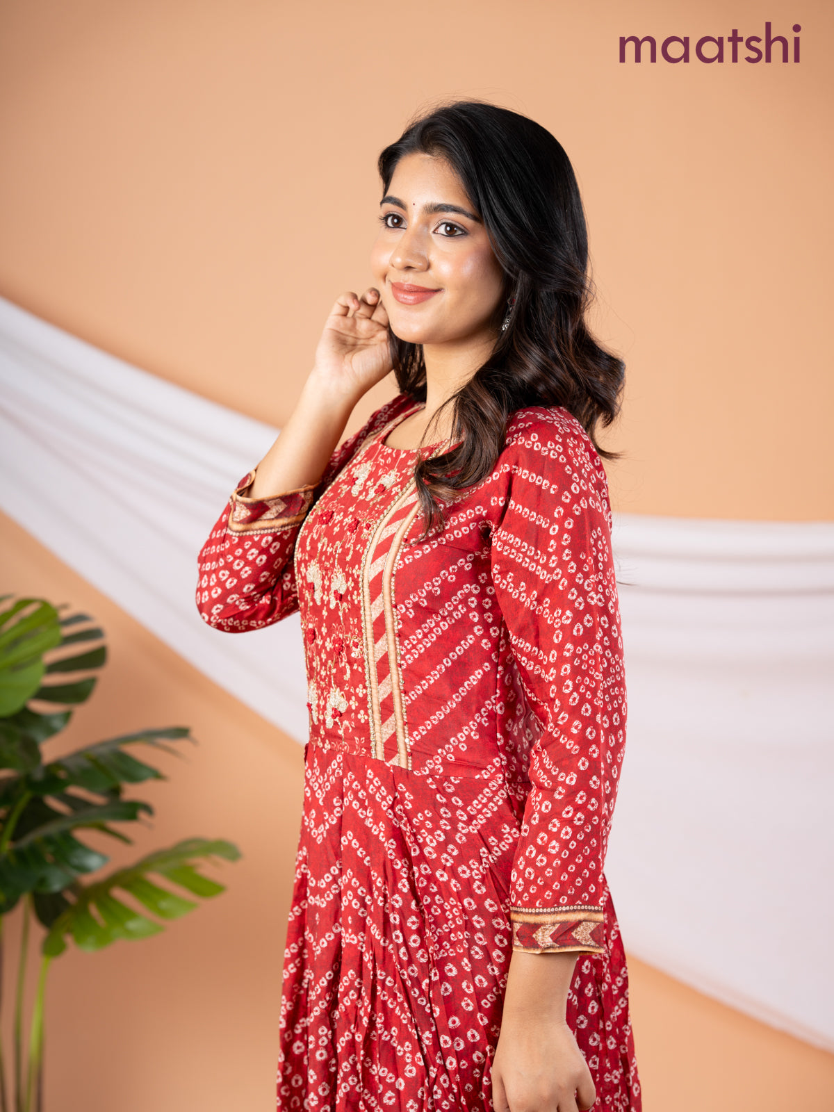 Muslin floor length dress red shade with allover prints & beaded neck pattern