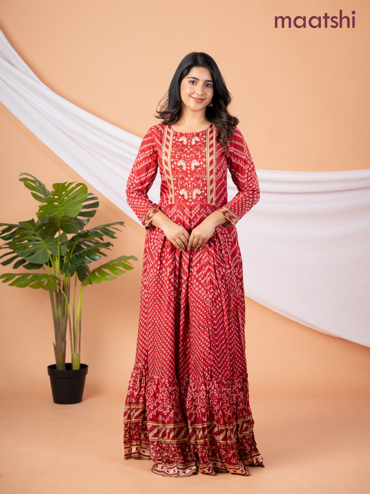 Muslin floor length dress red shade with allover prints & beaded neck pattern