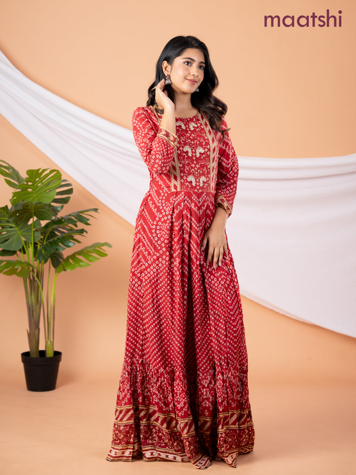 Muslin floor length dress red shade with allover prints & beaded neck pattern