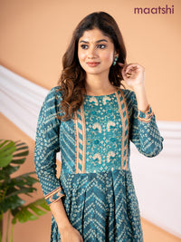Muslin floor length dress peacock green with allover bandhani prints & embroidery neck pattern