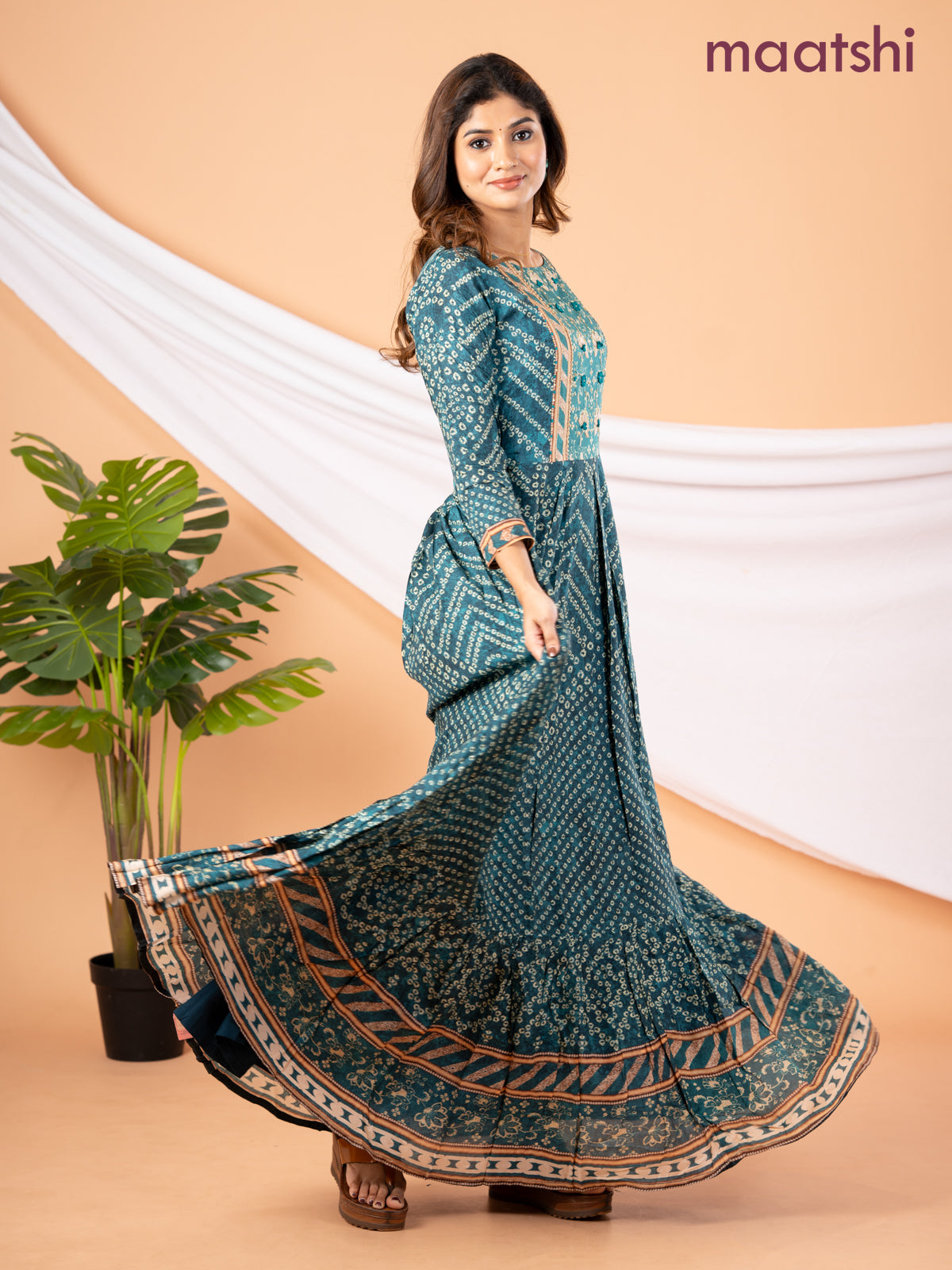 Muslin floor length dress peacock green with allover bandhani prints & embroidery neck pattern