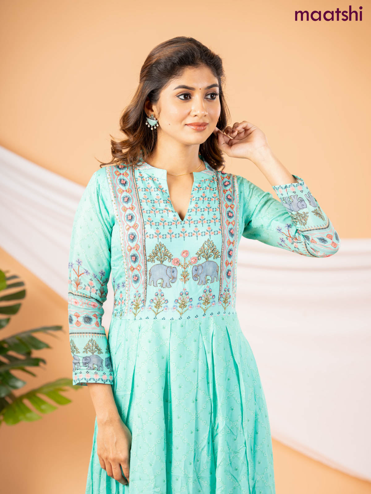 Muslin floor length dress teal green with allover floral prints & chamki neck pattern