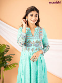 Muslin floor length dress teal green with allover floral prints & chamki neck pattern