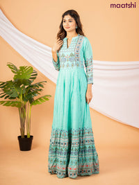 Muslin floor length dress teal green with allover floral prints & chamki neck pattern