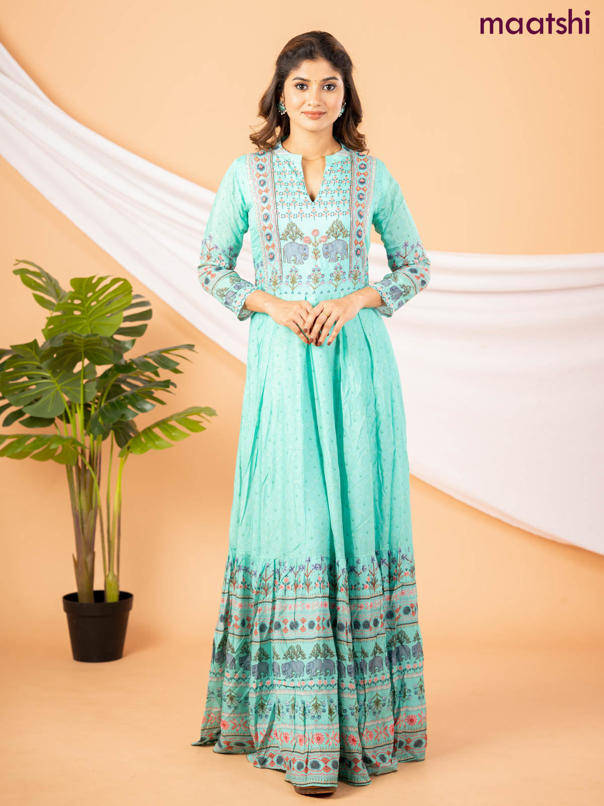 Muslin floor length dress teal green with allover floral prints & chamki neck pattern