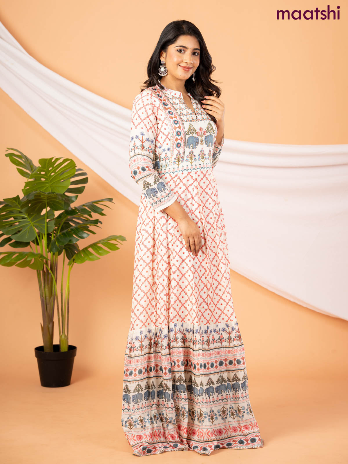 Muslin floor length dress off white with allover floral prints & chamki neck pattern