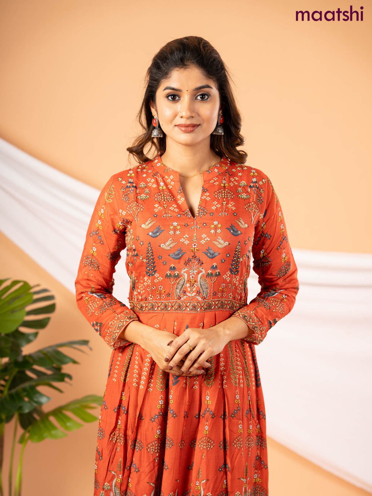 Muslin floor length dress rustic orange with allover prints & chamki beaded neck pattern