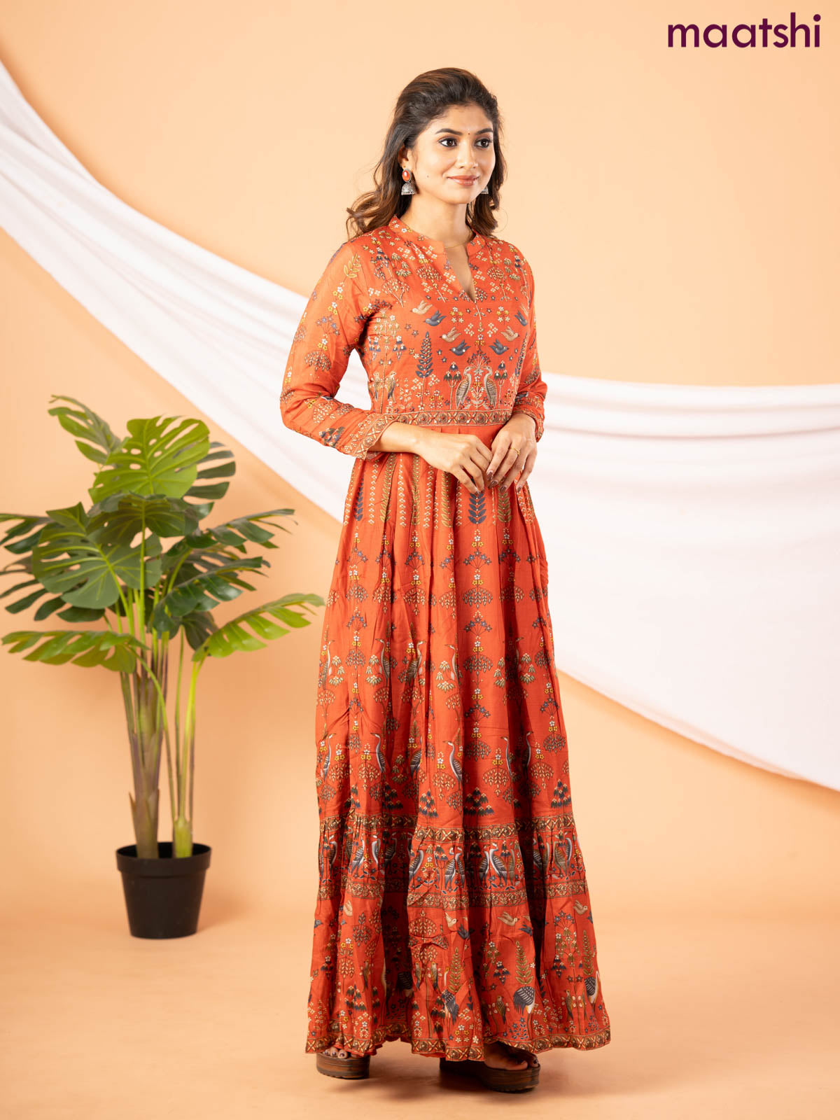 Muslin floor length dress rustic orange with allover prints & chamki beaded neck pattern