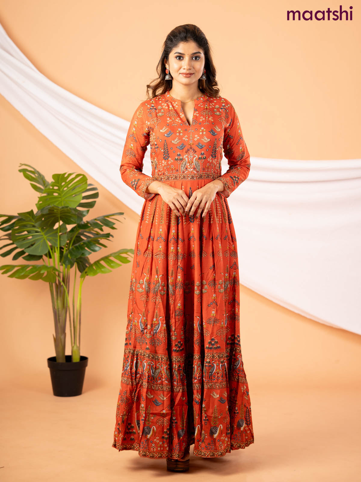 Muslin floor length dress rustic orange with allover prints & chamki beaded neck pattern