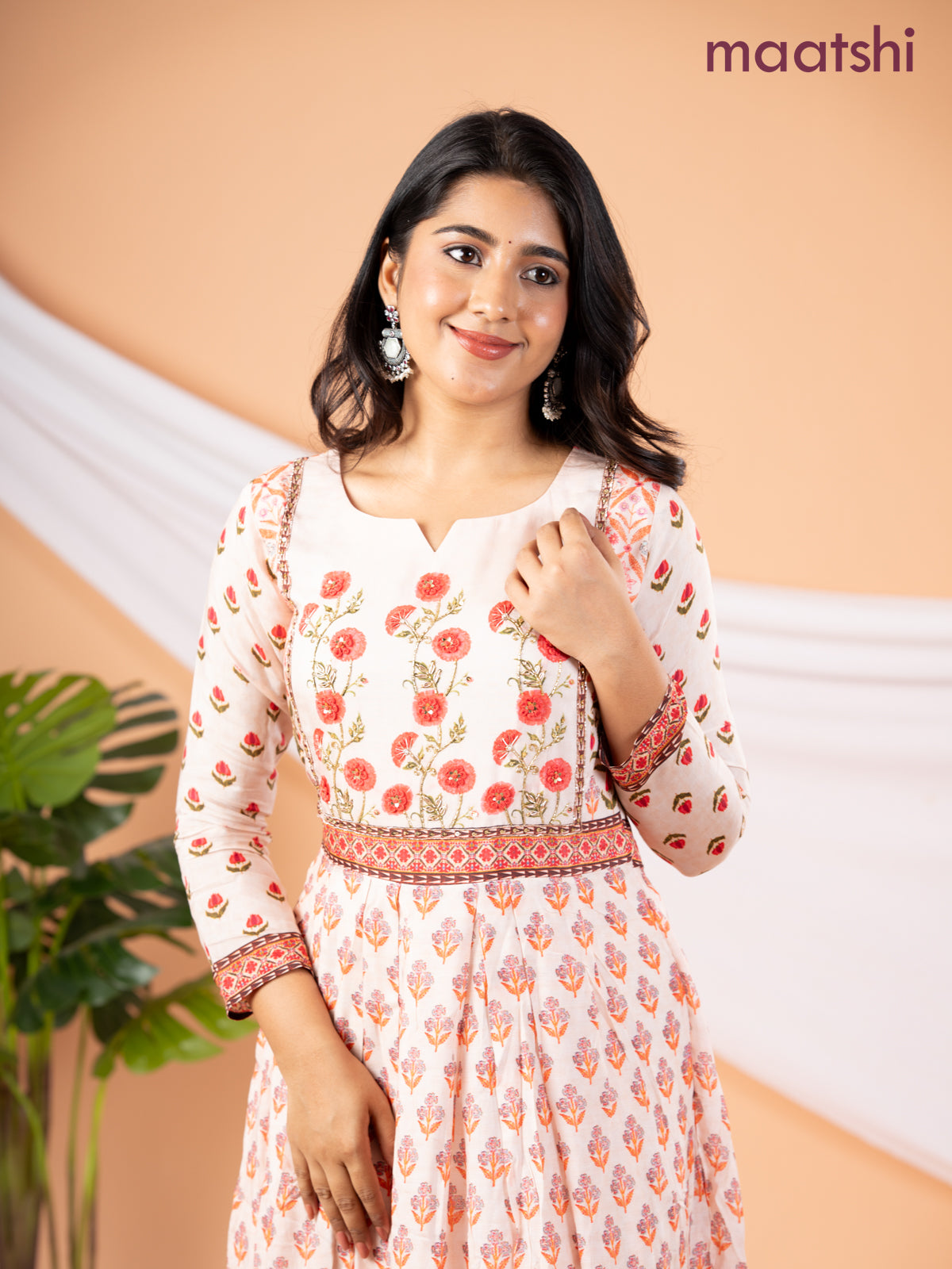 Pure muslin floor length dress peach shade with allover prints & embroidery neck pattern without pant